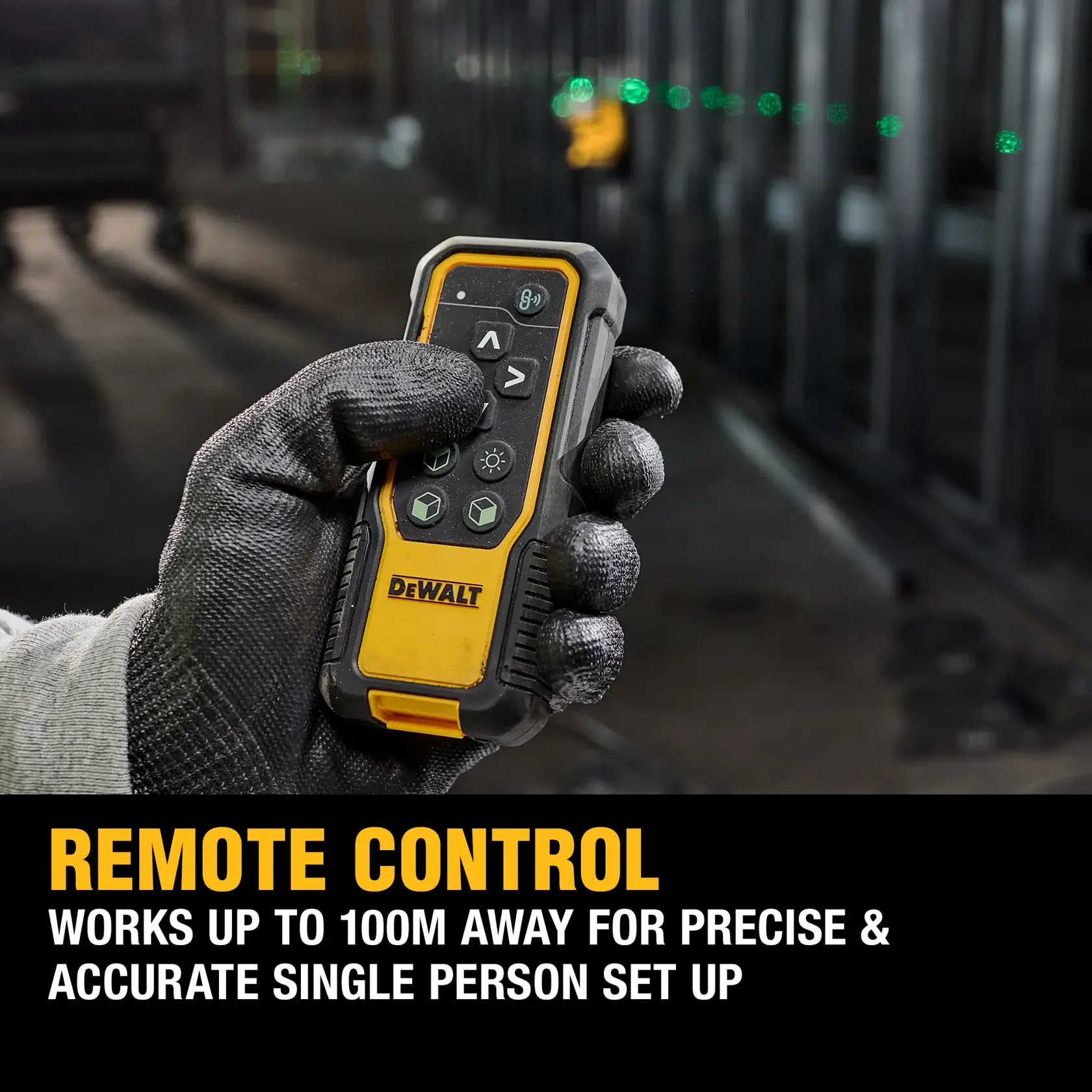 A DEWALT laser level device, model DCLE34035D1, mounted on a tripod in a construction site with scaffolding and a worker in
