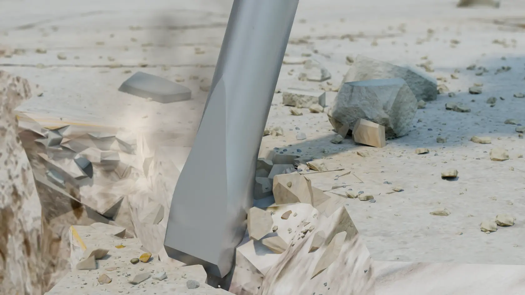 Close-up of a demolition tool chisel breaking concrete, with debris and rocks scattered around the impact area.
