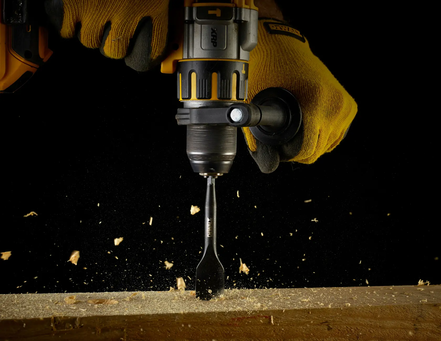 Graphic showing DEWALT XTREME Sub-Compact Series branding with the slogan 'Compact and Performance Packed' on a yellow background.