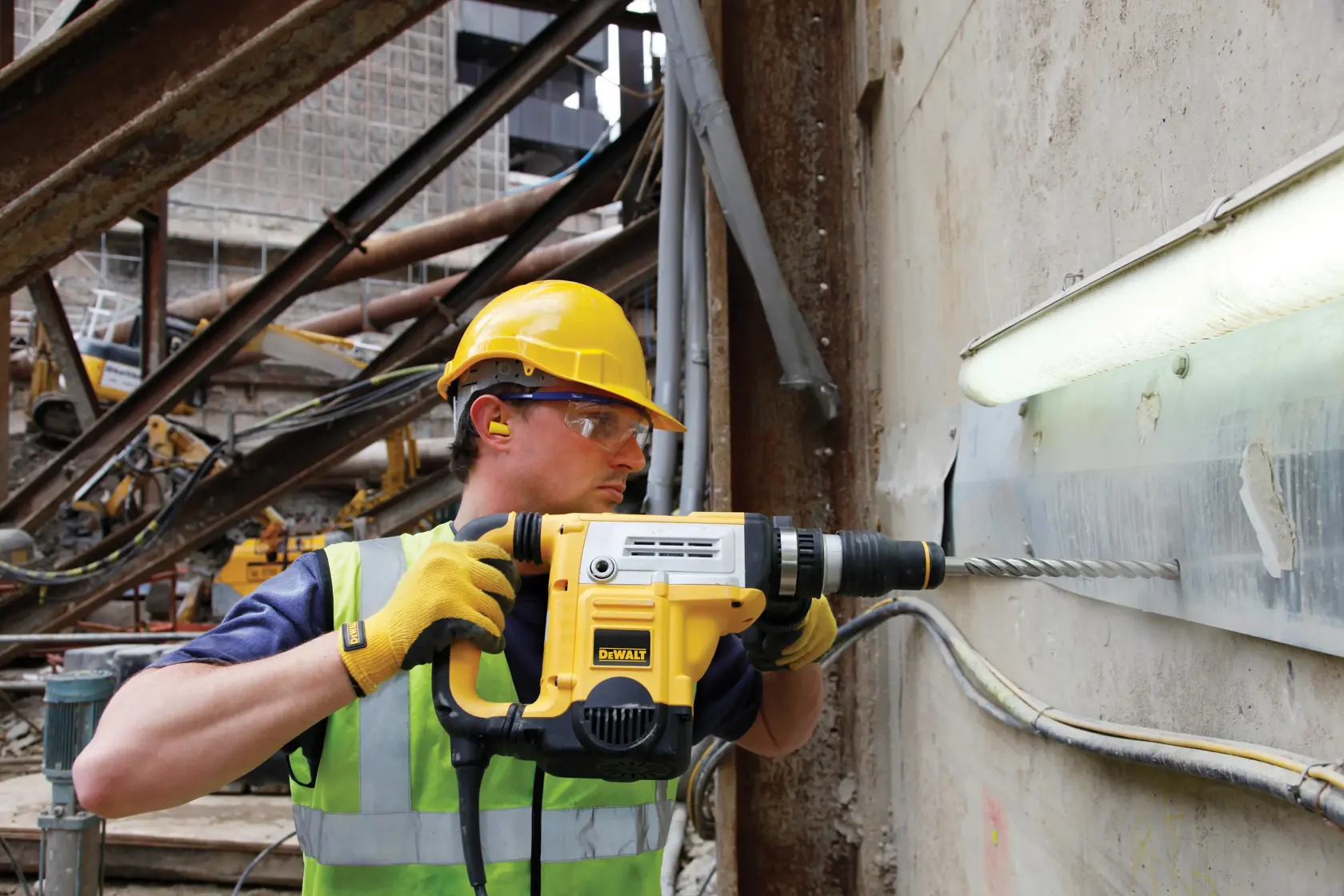 Graphic showing DEWALT XTREME Sub-Compact Series branding with the slogan 'Compact and Performance Packed' on a yellow background.