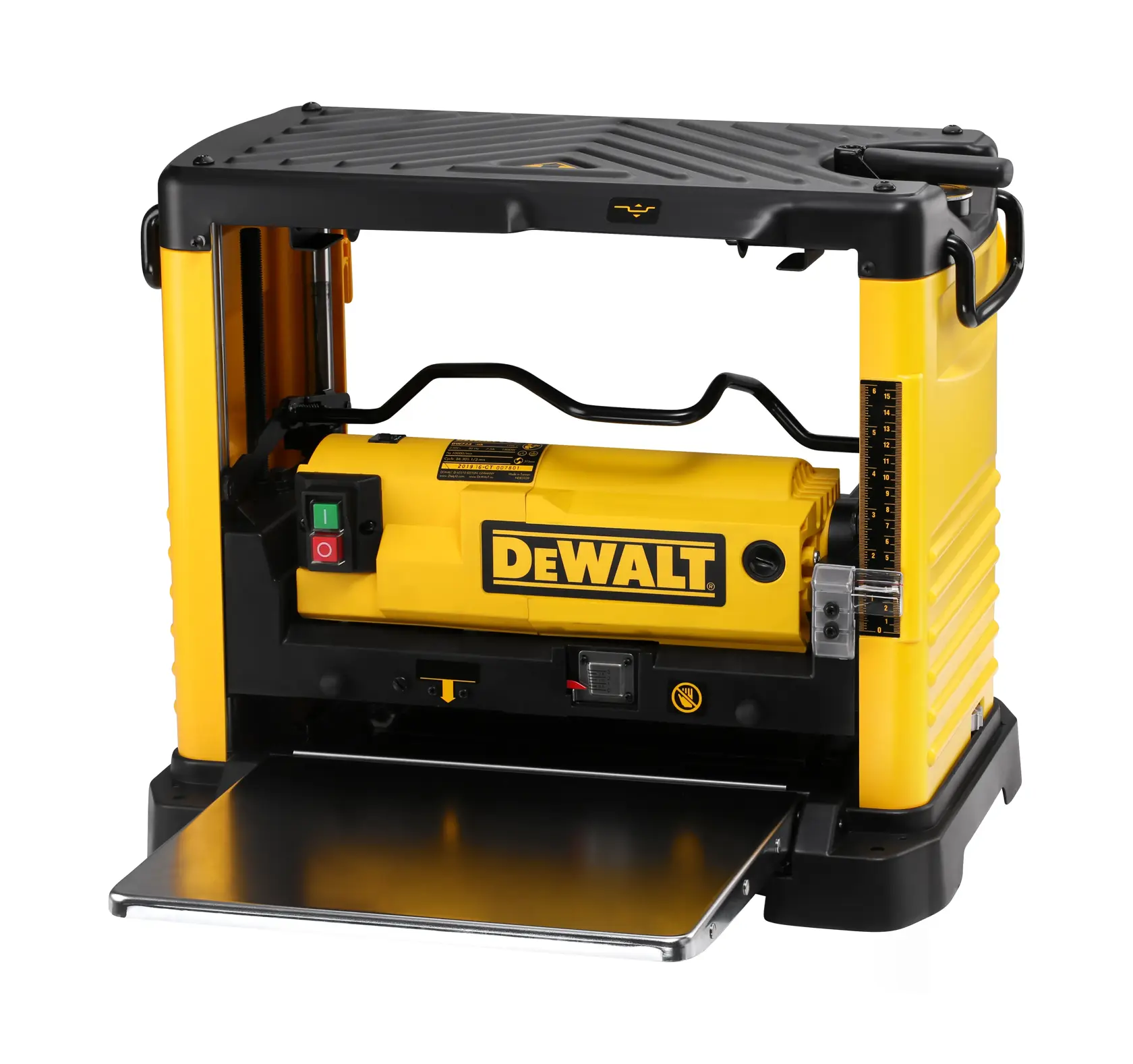 A DEWALT DW733 benchtop planer in yellow and black, used for woodworking. The planer has a flat metal feed table in the front and visible controls on the left side.