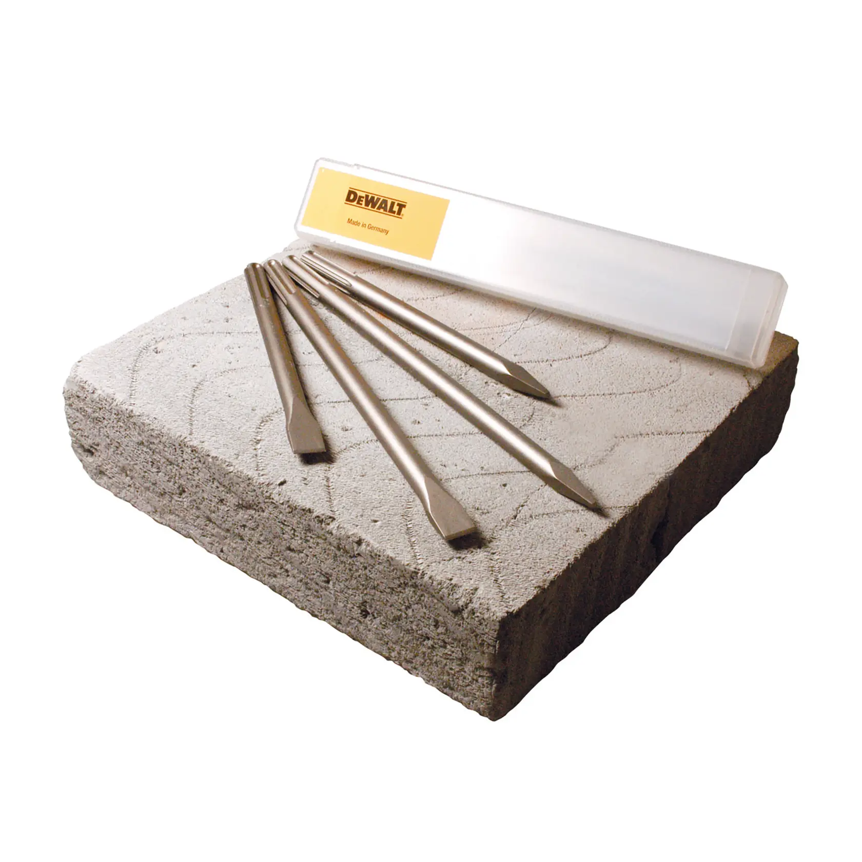 DEWALT SDS Max chisel set with four chisels and plastic case displayed on a concrete block.